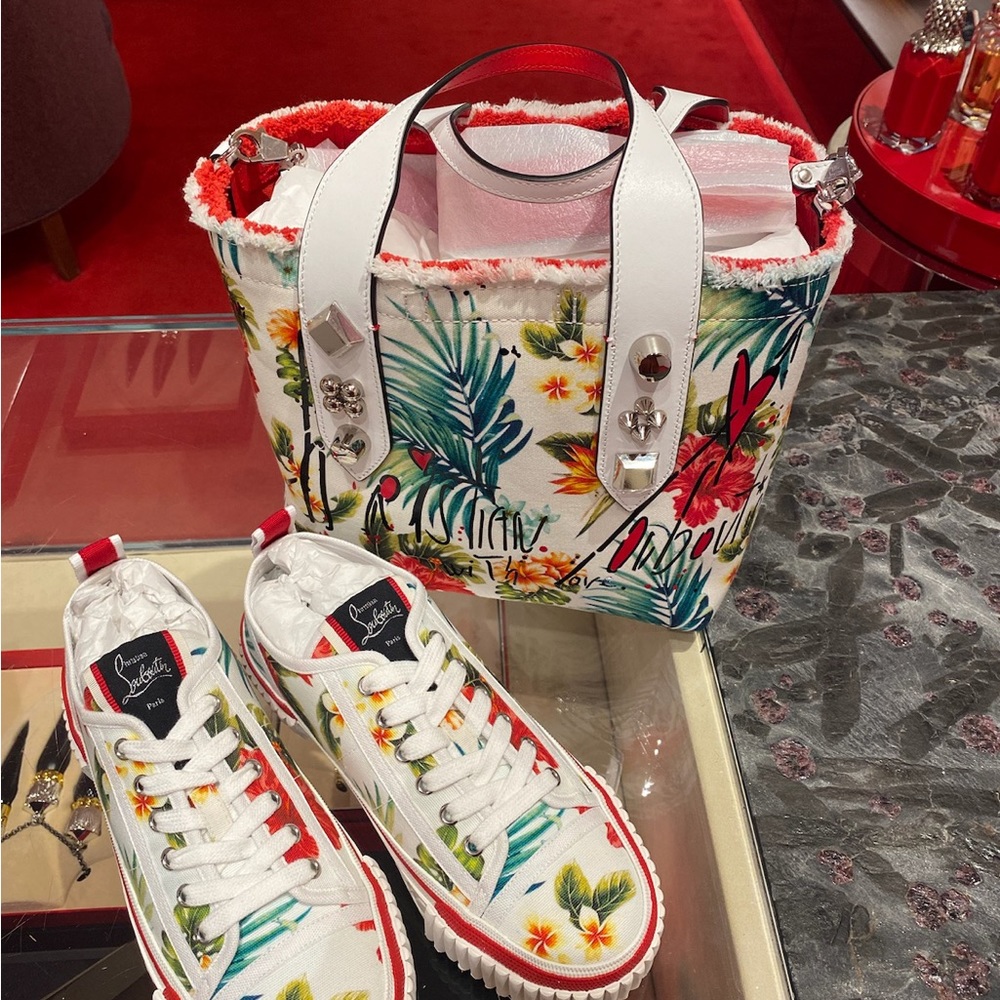 Brand New in box Exclusive Limited Design by Christian Louboutin!